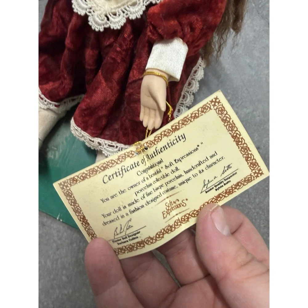 Dan Dee fine bisque porcelain animated wind-up musical doll, red‎ dress